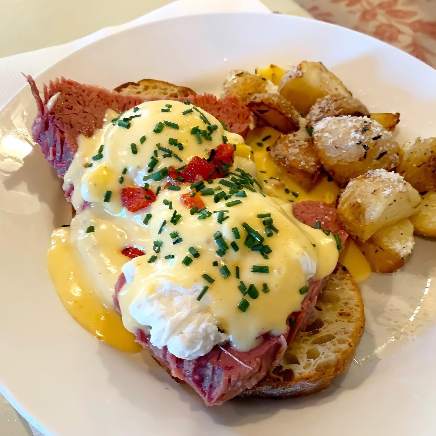Corned beef Benedict with poached eggs, hollandaise and crispy potatoes